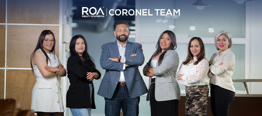 The Coronel Team, photographed together, in association with Realty of America.